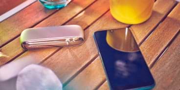 Girl unpacking her IQOS device