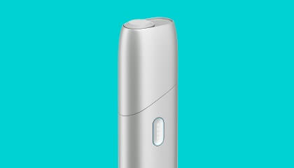 IQOS Originals ONE heated tobacco device in silver color.	 	 	