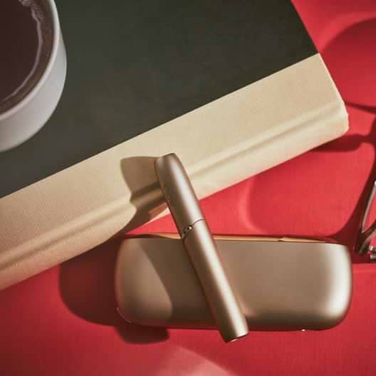 Gray IQOS with Notepad