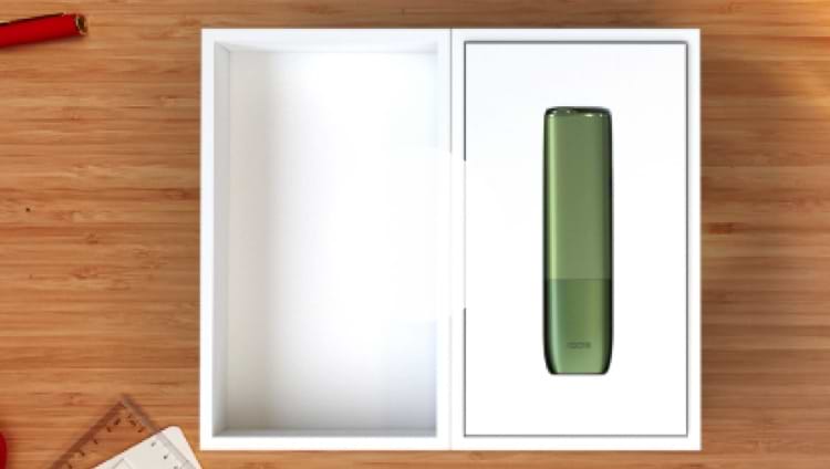 An IQOS ILUMA ONE in a box.