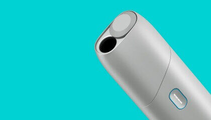 Silver IQOS Originals ONE heated tobacco device.