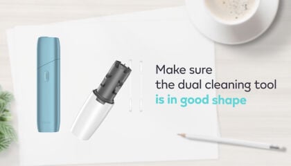 IQOS ORIGINALS ONE heated tobacco device and dual cleaning tool