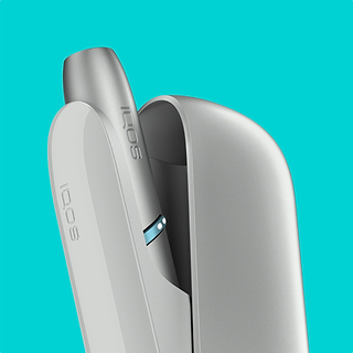 Silver IQOS Originals Duo heated tobacco holder and pocket charger.	 	 