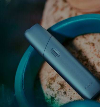 IQOS Originals Duo holder and pocket charger in red color.	 	