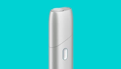 IQOS Originals ONE heated tobacco device in silver color.	 	 	