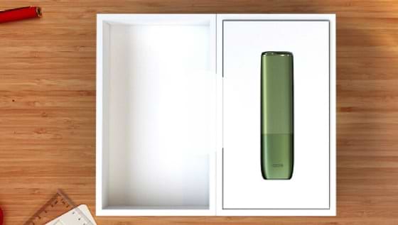 An IQOS ILUMA ONE in a box.