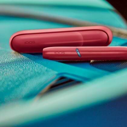 IQOS Originals Duo holder and pocket charger in red color.	 	 	