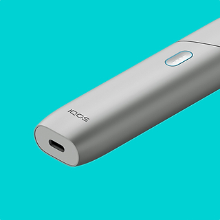 Silver IQOS Originals ONE heated tobacco device.	 	